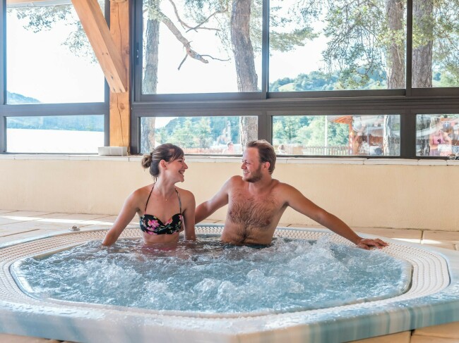 A happy couple in a jacuzzi